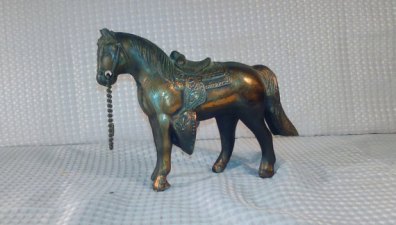 https://www.etsy.com/ca/listing/469747375/vintage-copper-colored-pot-metal-horse?