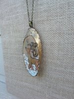 https://www.etsy.com/ca/listing/490630519/pendant-necklace-deer-in-snow-hand-drawn?