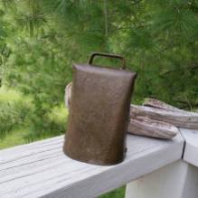 https://www.etsy.com/ca/listing/533536989/rustic-old-cow-bell-brass-over-steel?